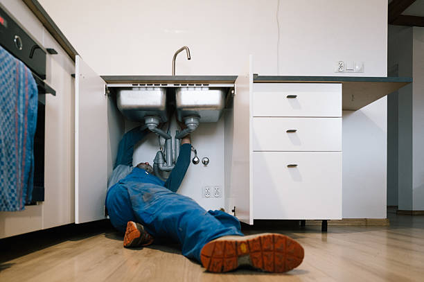 Professional Drain Cleaning technician working in Sharon, WI